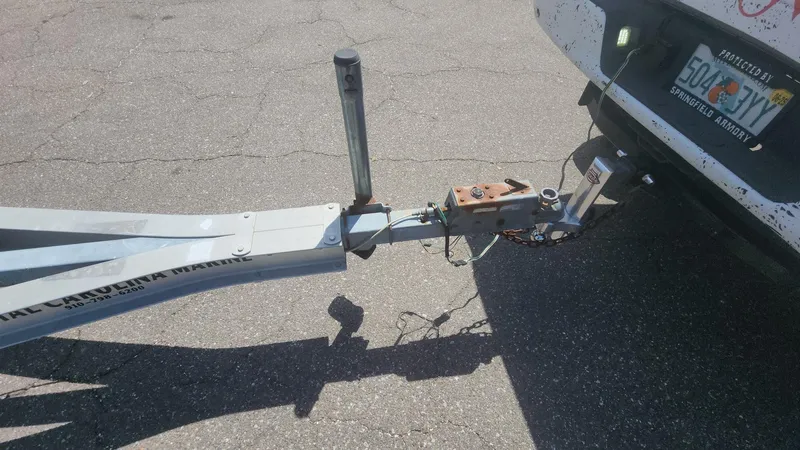 Slide: The Image of Trailer hitch connection on a 2003 Pro-Line 22 boat trailer. - 33
