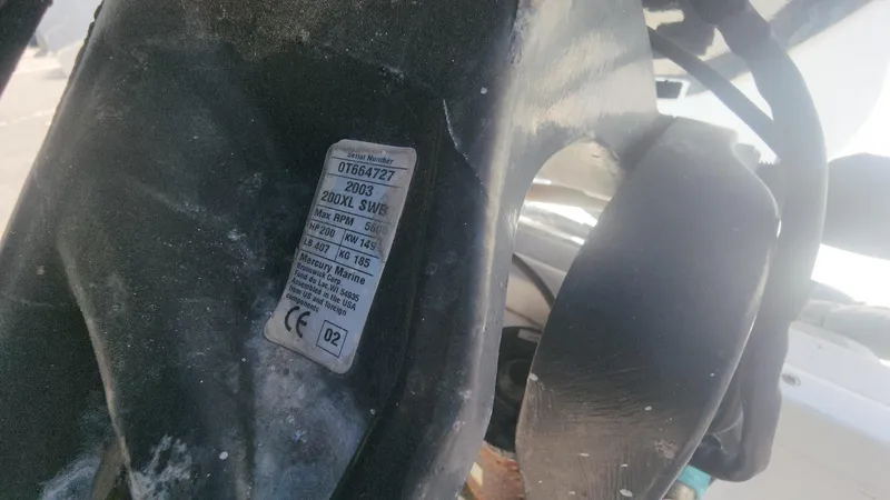 Slide: The Image of Label on a 2003 Pro-Line 22 boat, displaying model and specifications. - 50