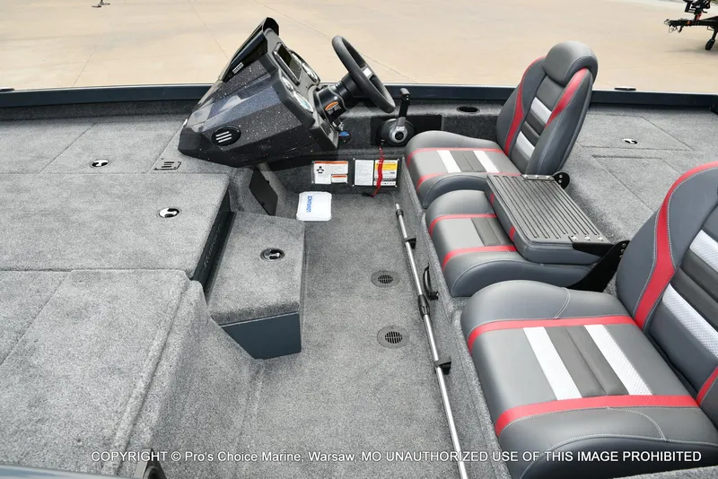 Slide: The Image of 2024 Ranger RT188P boat interior with dual seats and steering console. - 12
