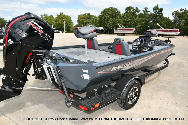 Slide: The Image of 2024 Ranger RT188P boat with 115HP Pro-XS engine, parked on a trailer. - 14