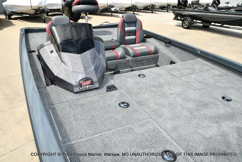 Slide: The Image of 2024 Ranger RT188P boat interior with seating and storage compartments. - 29