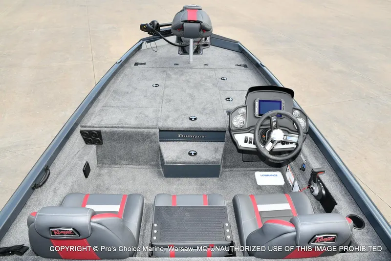 Slide: The Image of 2024 Ranger RT188P boat interior with steering console and seating. - 3