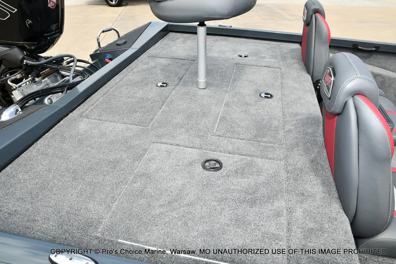 Slide: The Image of 2024 Ranger RT188P boat interior with carpeted deck and seating. - 31
