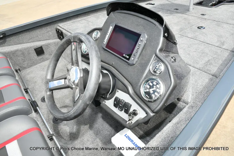 Slide: The Image of 2024 Ranger RT188P boat dashboard with steering wheel and electronic display. - 32