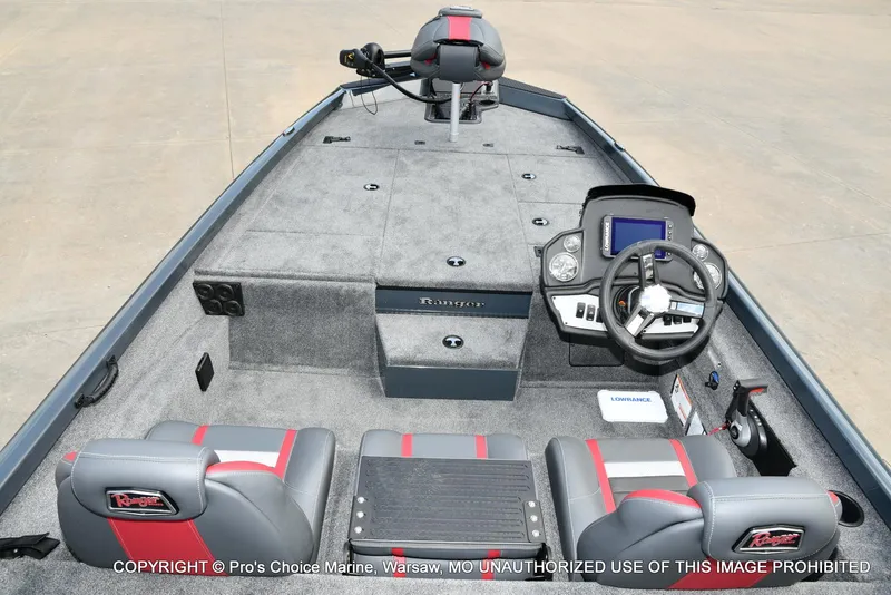 Slide: The Image of 2024 Ranger RT188P boat interior with steering console and seating. - 34
