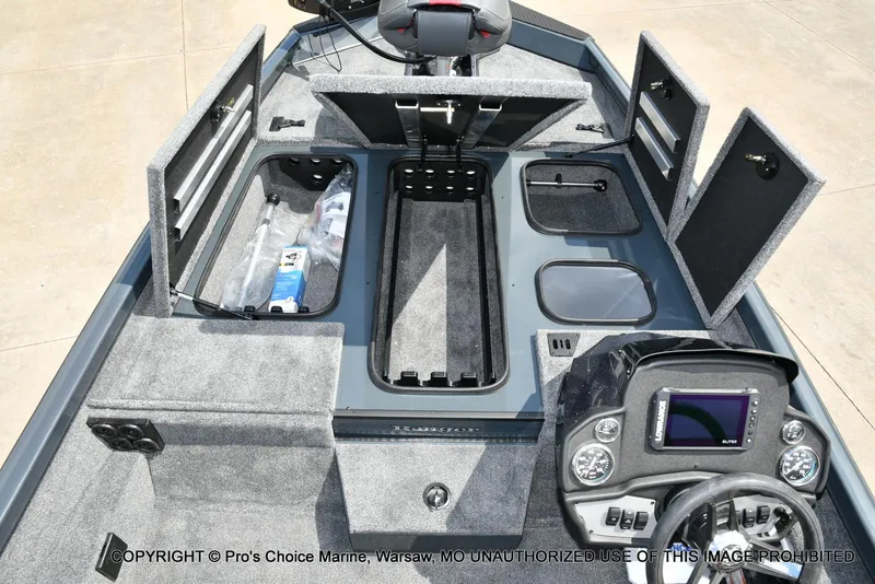Slide: The Image of 2024 Ranger RT188P boat interior with storage compartments and control panel. - 4