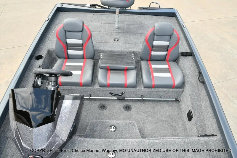 Slide: The Image of 2024 Ranger RT188P boat interior with gray and red seating, steering console, and carpeted flooring. - 44