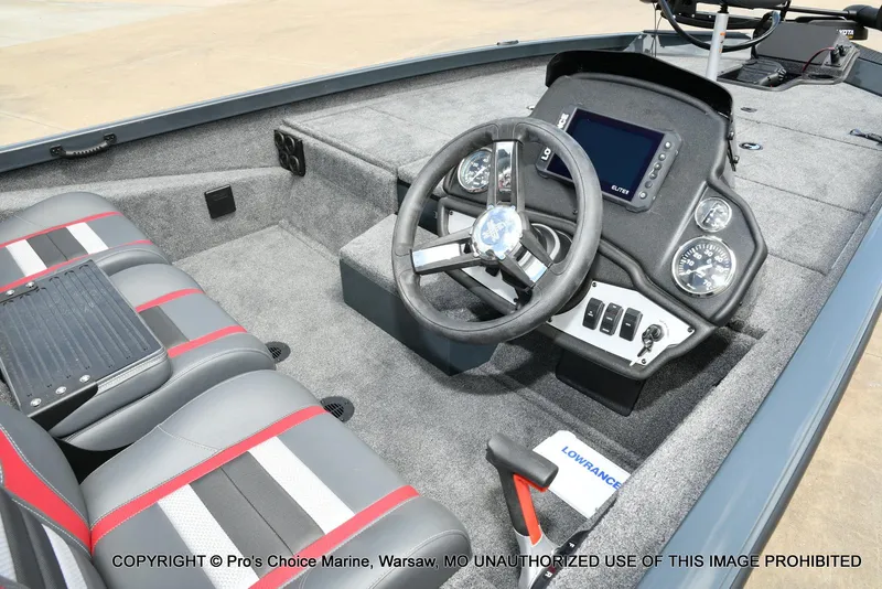 Slide: The Image of 2024 Ranger RT188P boat interior with steering console and seating. - 9