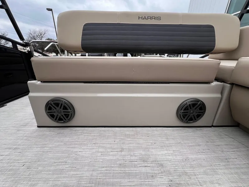 Slide: The Image of 2025 Harris Solstice 230 boat seating with integrated speakers, showcasing luxury and comfort. - 24