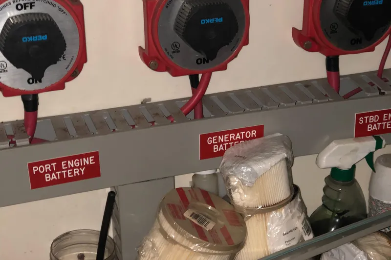 Slide: The Image of Battery switches and supplies on a 1987 Chris-Craft 426 Catalina boat. - 24