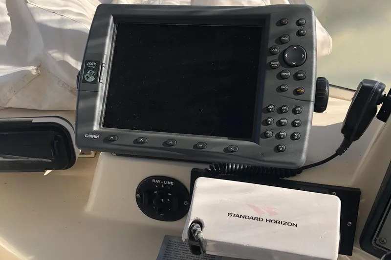 Slide: The Image of Navigation equipment on 1987 Chris-Craft 426 Catalina boat dashboard. - 34