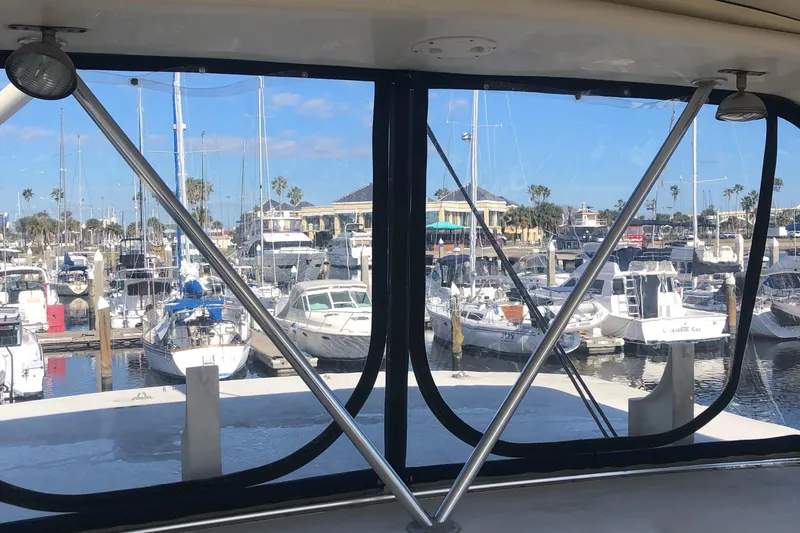 Slide: The Image of View from 1987 Chris-Craft 426 Catalina, overlooking a marina with numerous boats docked. - 37