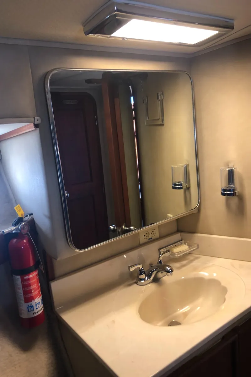 Slide: The Image of Bathroom sink area in 1987 Chris-Craft 426 Catalina yacht. - 6
