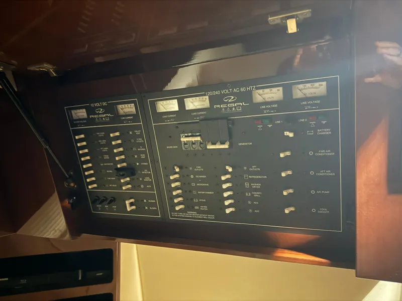 Slide: The Image of Control panel of a 2015 Regal 42 Sport Coupe yacht. - 16