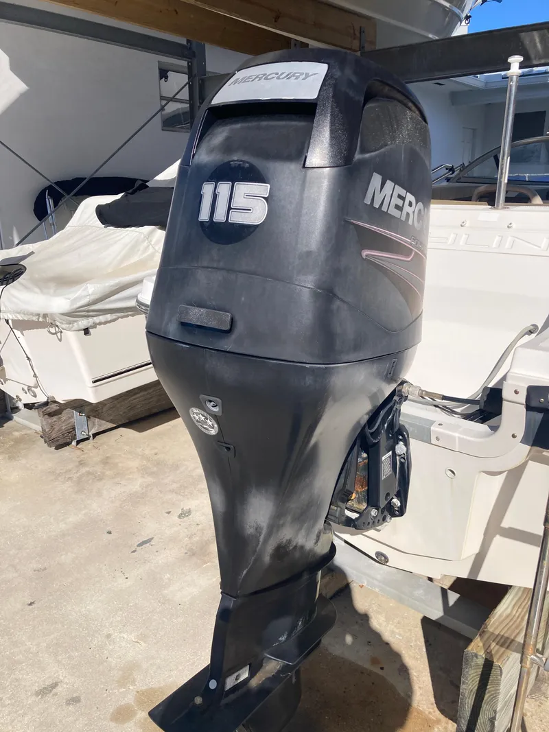 Slide: The Image of Mercury 115 outboard motor on 2014 Bayliner 180 Bowrider boat. - 11