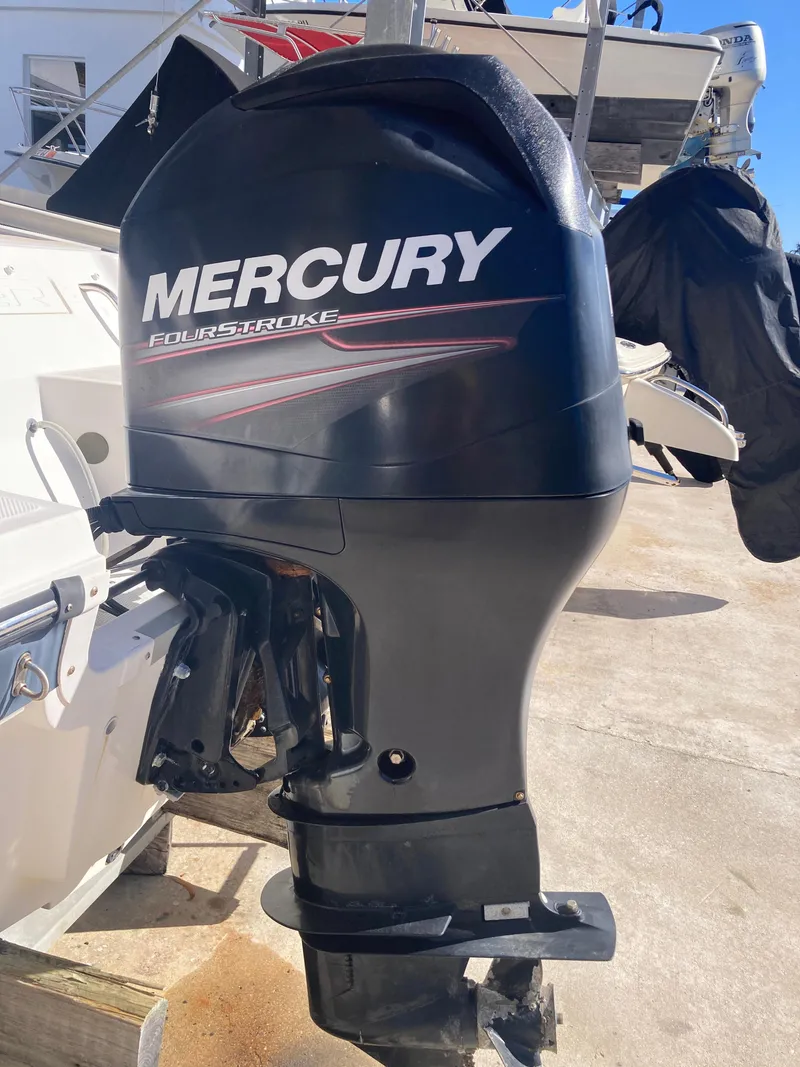 Slide: The Image of Mercury FourStroke outboard motor on 2014 Bayliner 180 Bowrider boat. - 14