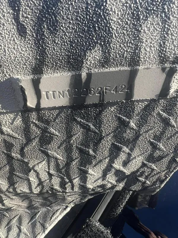 Slide: The Image of Havoc Boats 2024 model 1756MSTC with serial number TTN12262F42 on textured surface. - 11