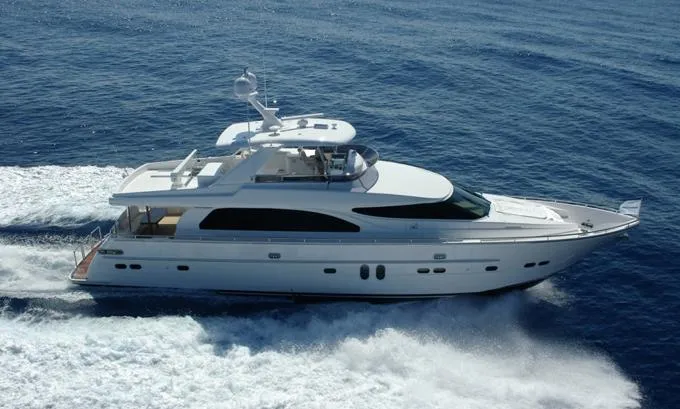 Slide: The Image of 2008 Horizon E76 Open Bridge Motoryacht cruising on open water. - 0
