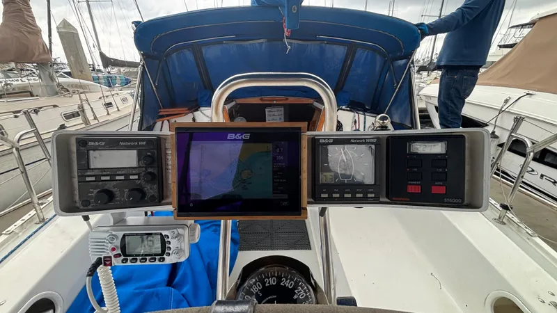 Slide: The Image of Cockpit of 1994 Catalina 36 sailboat with navigation instruments and compass. - 19
