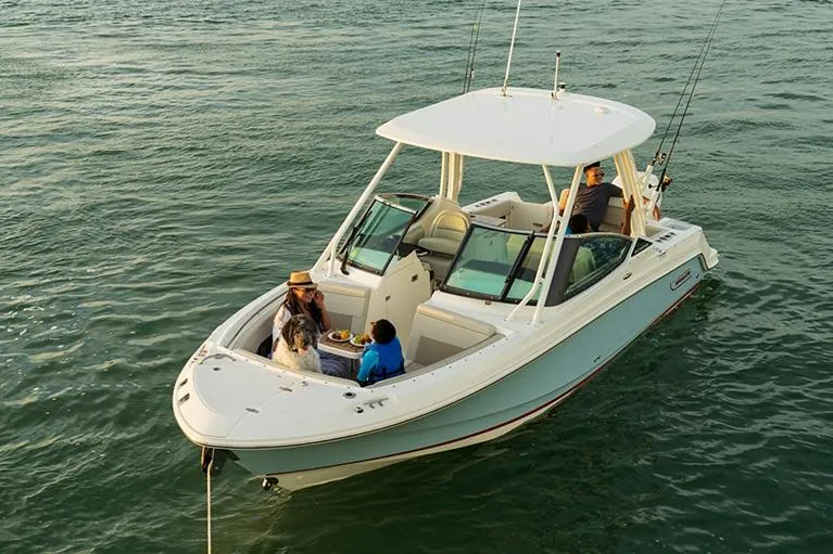 Slide: The Image of 2025 Boston Whaler 240 Vantage boat interior with modern helm and seating. - 7