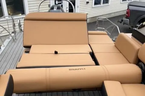 Slide: The Image of 2022 Harris Solstice 230 boat with tan leather seating and modern design. - 10