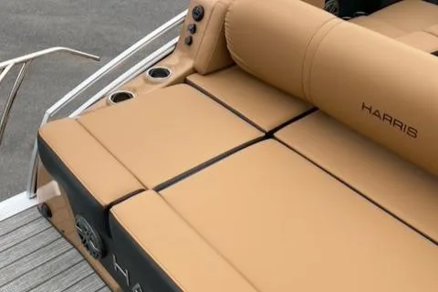 Slide: The Image of Luxury seating on 2022 Harris Solstice 230 boat with tan upholstery. - 19