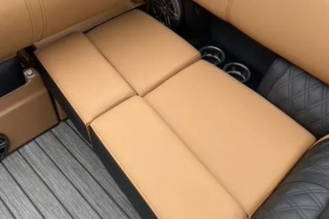 Slide: The Image of Luxurious tan seating in 2022 Harris Solstice 230 boat interior. - 24