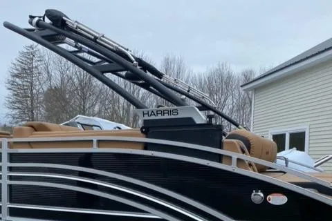 Slide: The Image of 2022 Harris Solstice 230 pontoon boat with sleek design and modern features. - 5