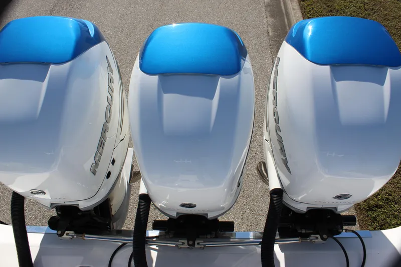 Slide: The Image of Three Mercury outboard engines on a 2018 Fountain 38 CC boat. - 42
