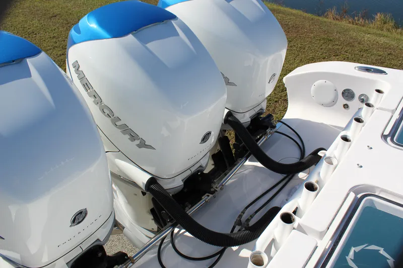 Slide: The Image of 2018 Fountain 38 CC boat with triple Mercury outboard engines. - 44