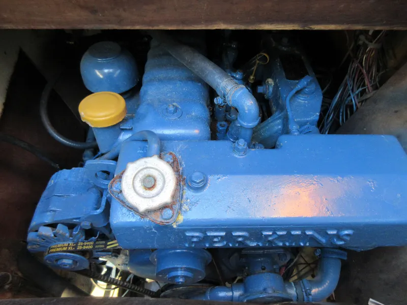 Slide: The Image of 1978 Islander sailboat engine, blue Perkins diesel, detailed view. - 5