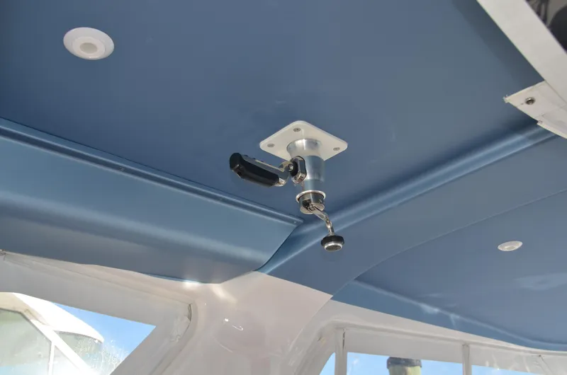 Slide: The Image of Ceiling detail of 2022 Intrepid 438 Evolution boat with mounted handle. - 16