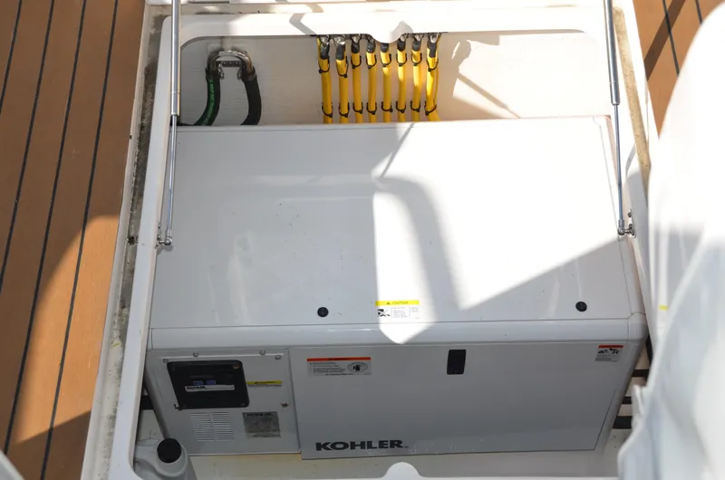 Slide: The Image of Kohler generator in 2022 Intrepid 438 Evolution boat engine compartment. - 25