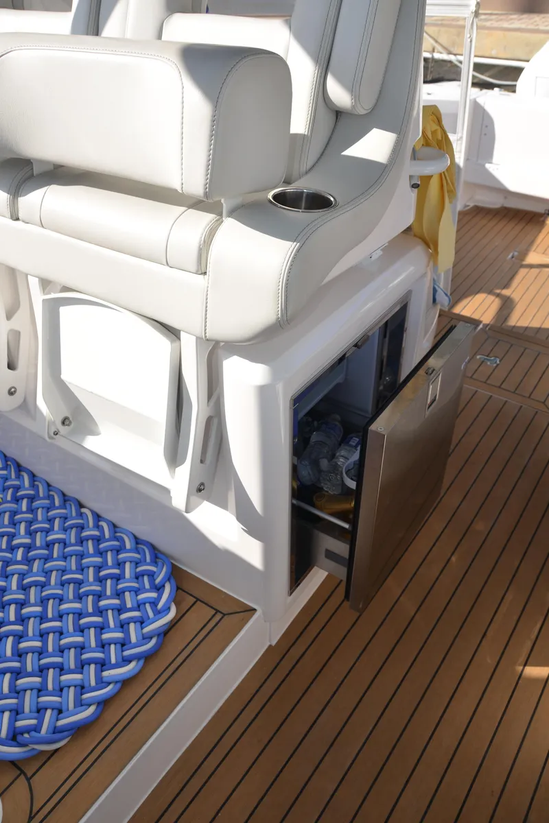 Slide: The Image of Luxury seating and storage on 2022 Intrepid 438 Evolution yacht deck. - 9