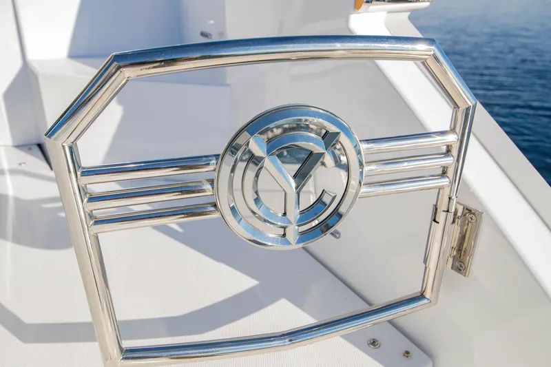 Slide: The Image of Chrome railing on 2025 Cruisers Yachts 46 Cantius, featuring sleek design and logo. - 16