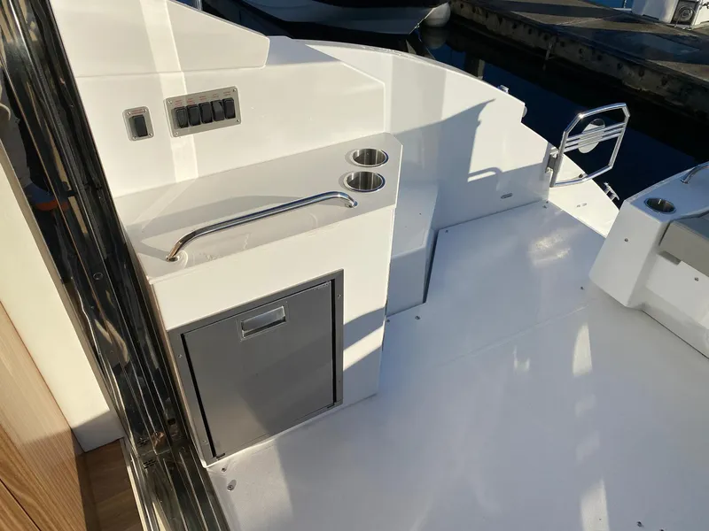 Slide: The Image of 2025 Cruisers Yachts 46 Cantius deck with sleek design and modern amenities. - 21