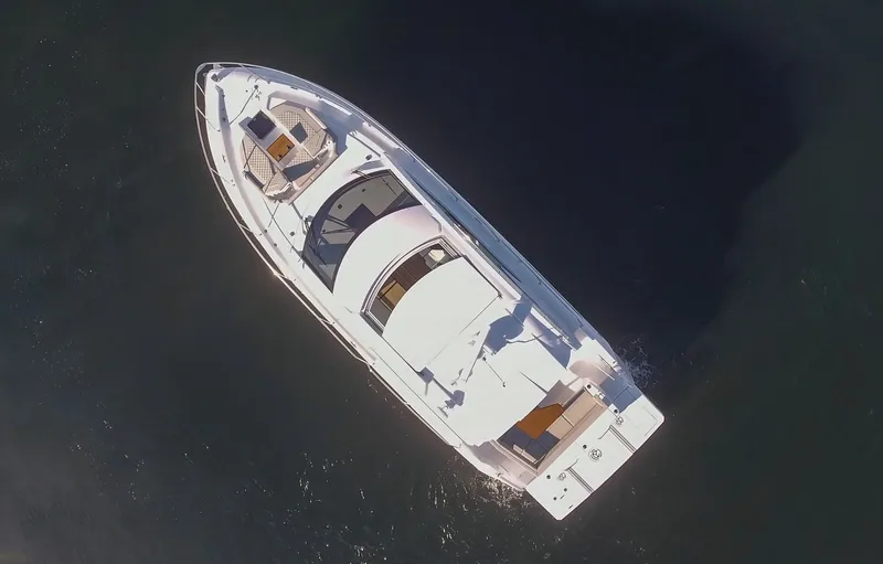 Slide: The Image of Aerial view of 2025 Cruisers Yachts 46 Cantius luxury boat on water. - 8
