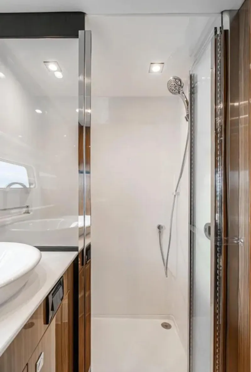 Slide: The Image of Luxurious bathroom in 2025 Cruisers Yachts 50 GLS with modern shower design. - 39