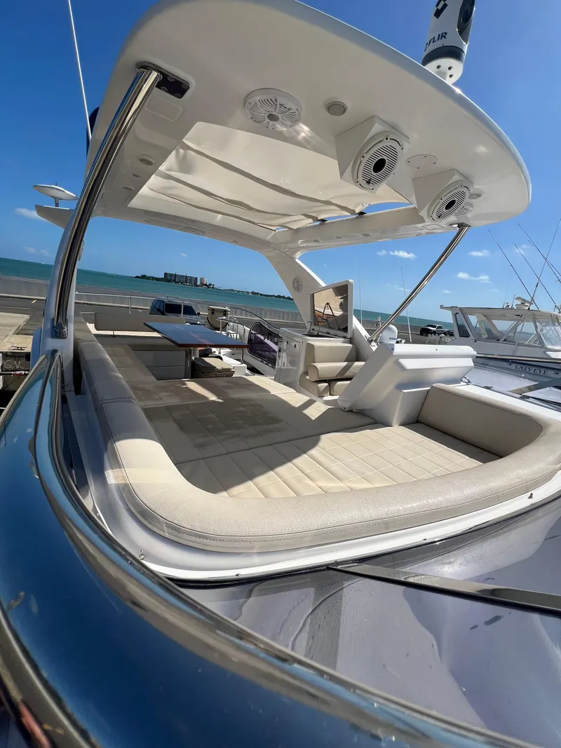 Slide: The Image of 2016 Azimut 54fly yacht with spacious deck, luxurious seating, and ocean view. - 30