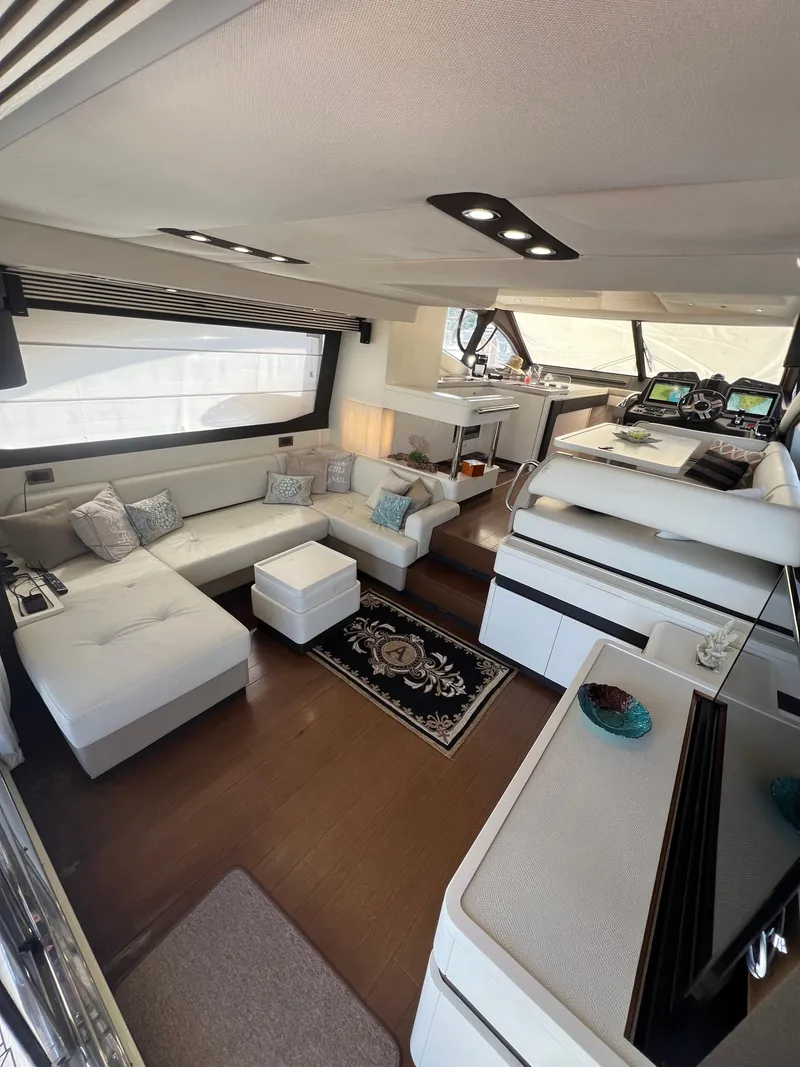 Slide: The Image of Luxurious interior of 2016 Azimut 54fly yacht with modern furnishings and elegant design. - 32
