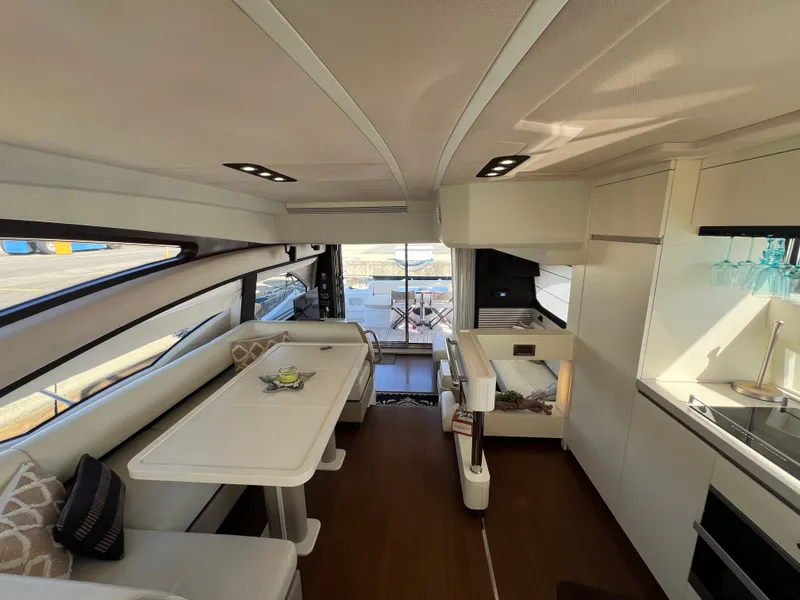 Slide: The Image of Luxurious interior of 2016 Azimut 54fly yacht with modern dining and kitchen area. - 40
