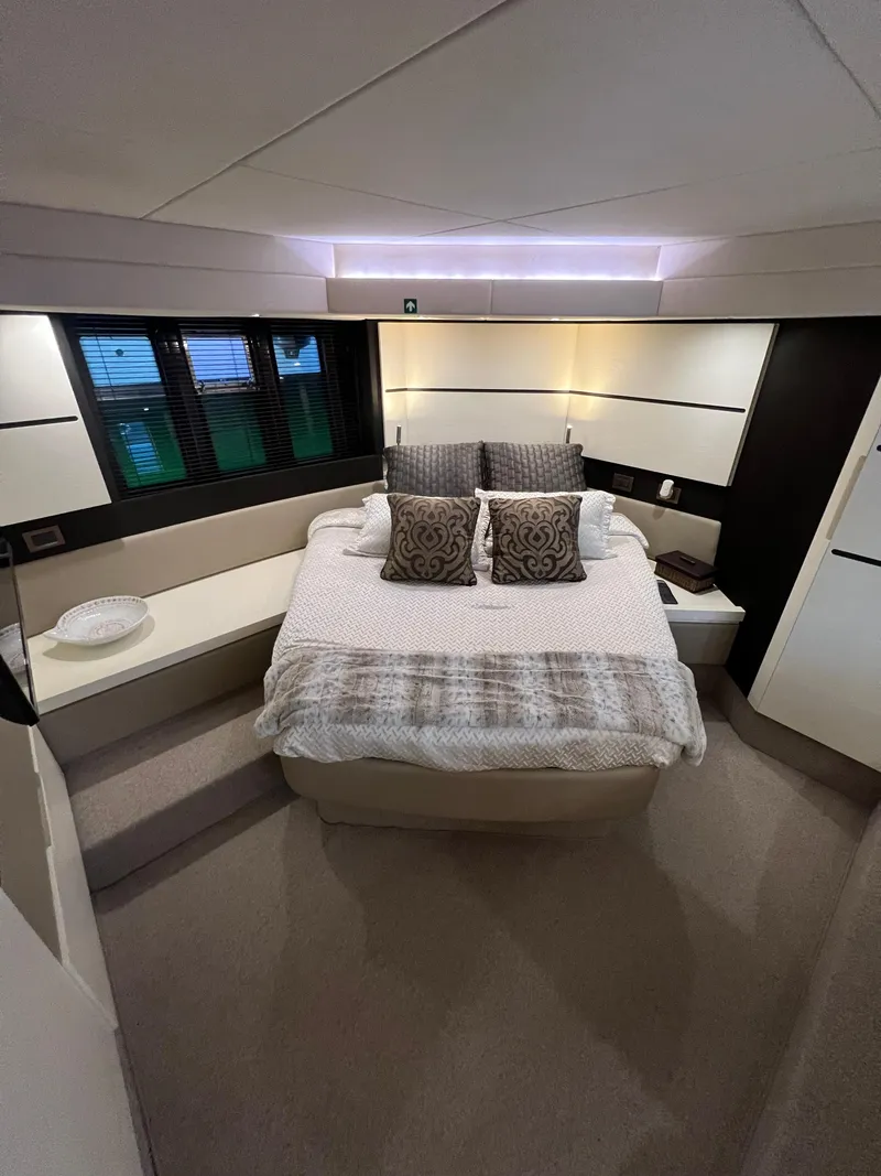 Slide: The Image of Luxurious bedroom interior of 2016 Azimut 54fly yacht with modern design and cozy bedding. - 47