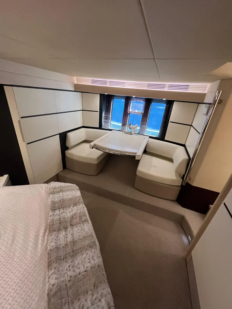 Slide: The Image of Luxurious interior of 2016 Azimut 54fly yacht with modern seating and table. - 48