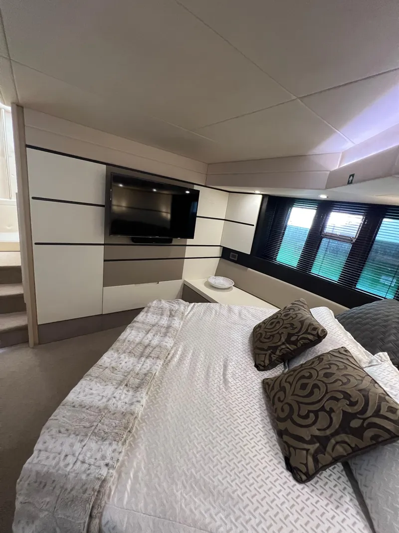 Slide: The Image of Luxurious bedroom interior of 2016 Azimut 54fly yacht with elegant decor and ocean view. - 49