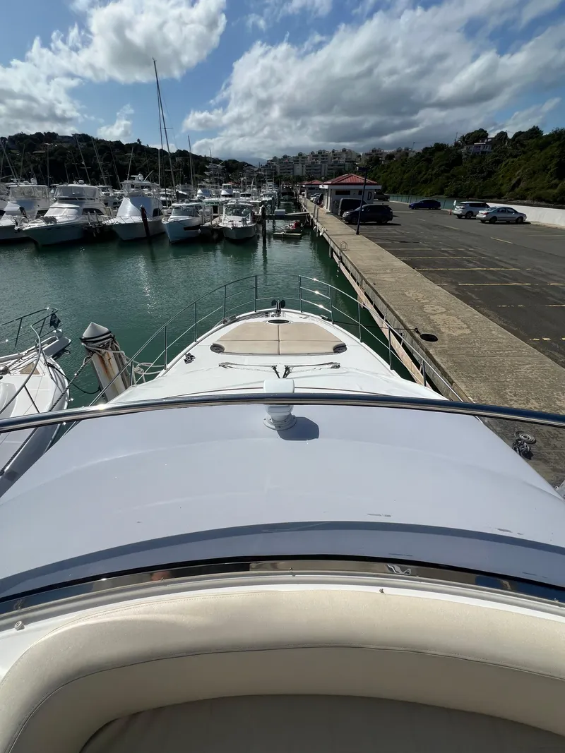 Slide: The Image of Azimut 54fly 2016 yacht docked at marina with scenic view. - 5