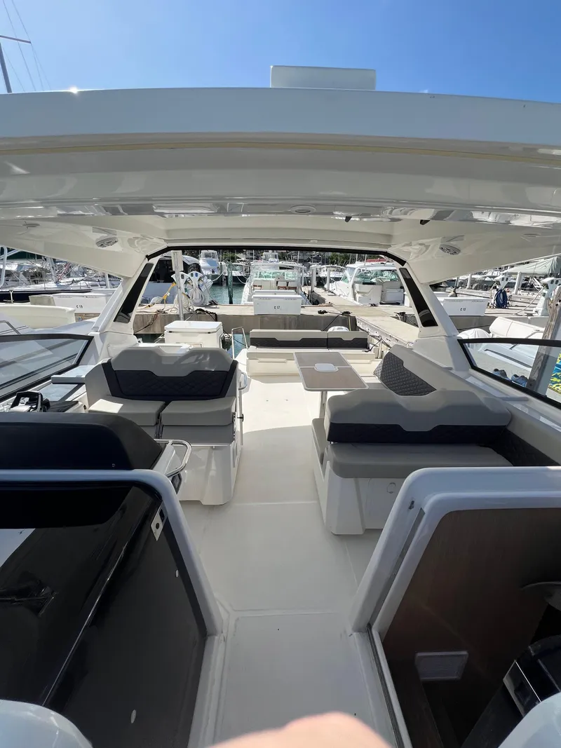 Slide: The Image of 2023 Aquila 36 Sport yacht interior with spacious seating and modern design. - 29