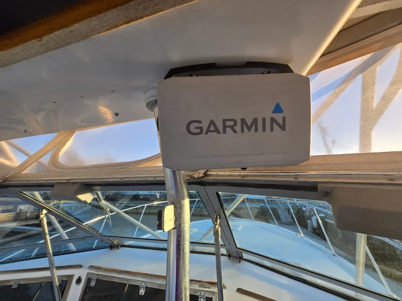 Slide: The Image of 1984 Topaz 36 Sportfisherman boat with Garmin navigation system installed. - 16