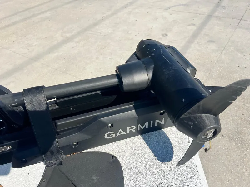 Slide: The Image of Garmin boat motor on Express H18, 2013 model, with visible propeller. - 10