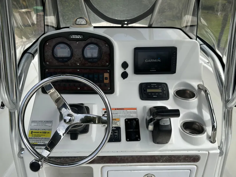 Slide: The Image of Control panel of a 2013 Sea Hunt Ultra 225 boat with Garmin navigation system. - 27