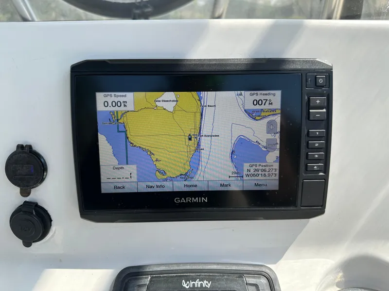 Slide: The Image of Garmin GPS display on 2013 Sea Hunt Ultra 225 boat dashboard. - 28